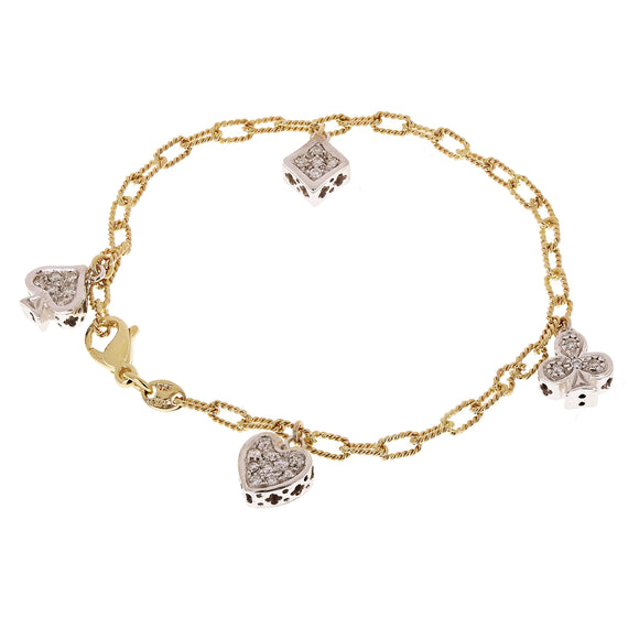A beautiful, real gold charm bracelet with four intricate charms from Direct Source Gold & Diamond.