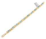 14k Yellow Gold Blue Topaz X Criss Cross Bracelet 7.25" 6.7mm 14.5 grams