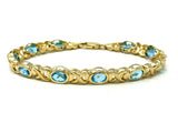 14k Yellow Gold Blue Topaz X Criss Cross Bracelet 7.25" 6.7mm 14.5 grams